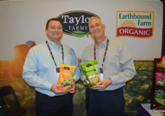 Chris Dreier and Chris Downs with Taylor Farms show some of the company’s latest salad kits: a Tangerine Crunch salad and an Avocado Ranch salad.